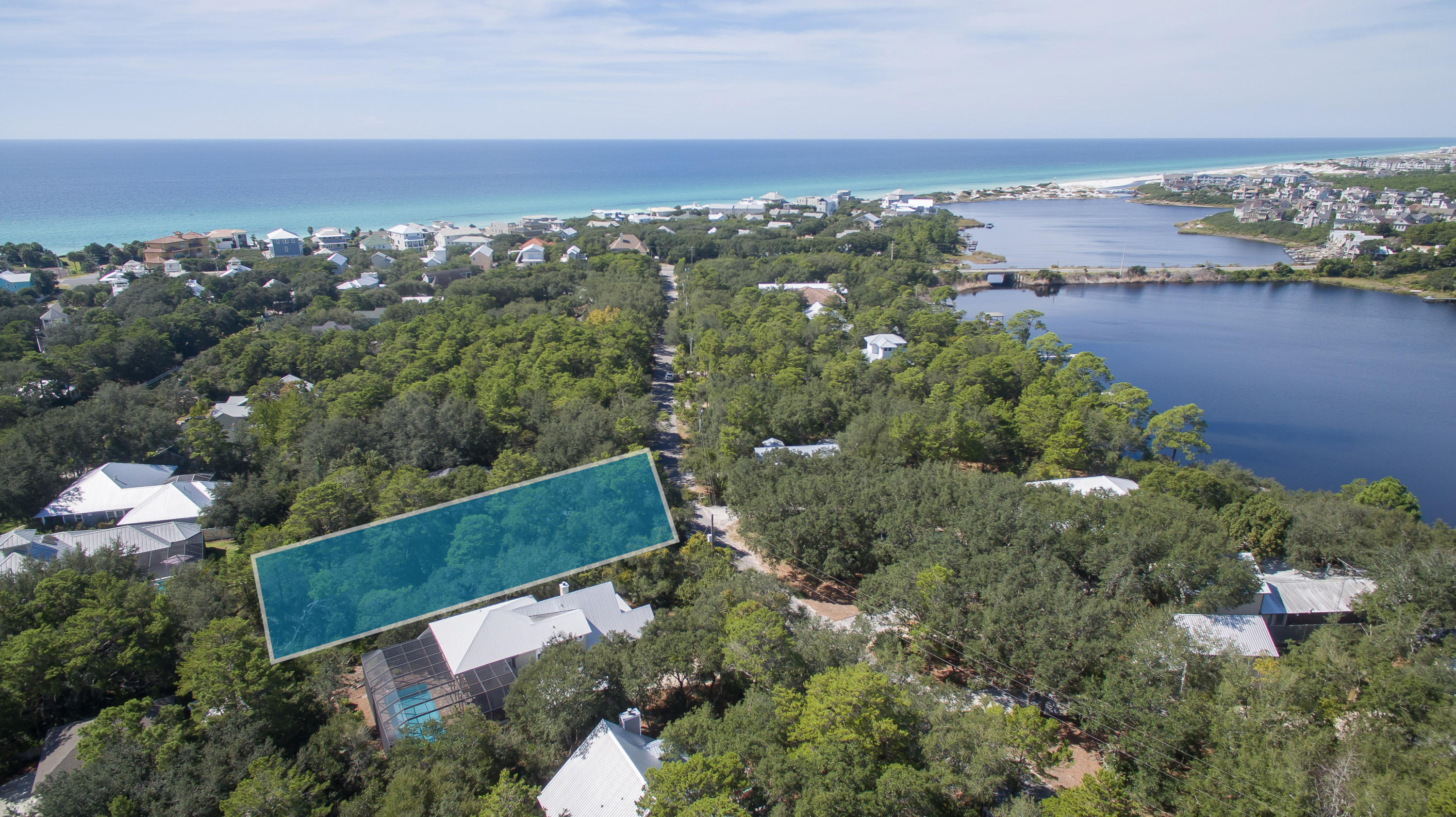 Lot 4 South Camp Creek Rd Inlet Beach Inlet Beach, FL 32461 - Photo 1 of 3 an aerial view of ocean and residential houses with outdoor space