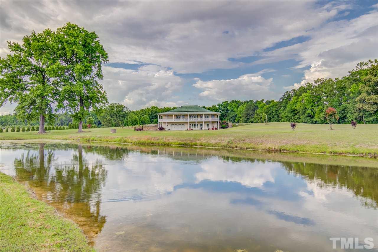 703 Kirk Adams Road Angier, NC 27501 - Photo 2 of 25 Enjoy daily views of your own private pond, with fish and other wildlife to check out.