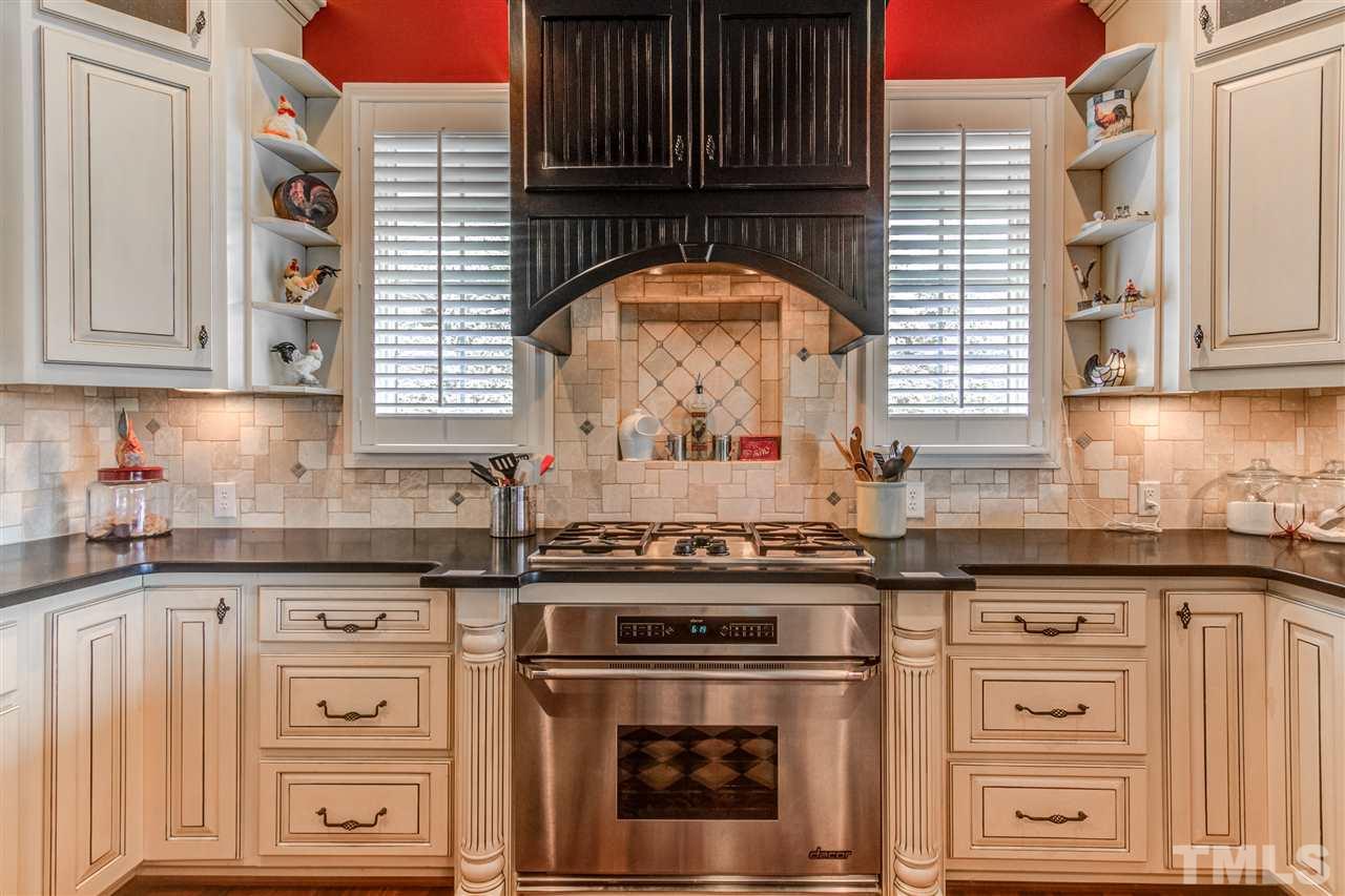 703 Kirk Adams Road Angier, NC 27501 - Photo 13 of 25 The Chef in the family will enjoy using this Dacor Luxury Range!