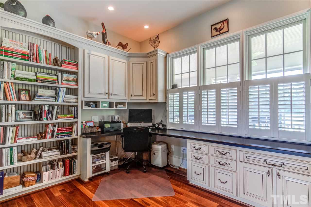 703 Kirk Adams Road Angier, NC 27501 - Photo 14 of 25 Plenty of room for working from home or doing homework in this office right off the kitchen and side entry.