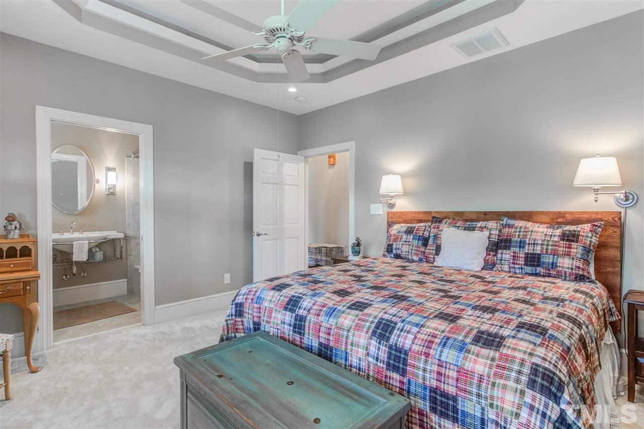 703 Kirk Adams Road Angier, NC 27501 - Photo 19 of 25 Really a second Master Suite on the main level! Double tray ceiling and full bath!