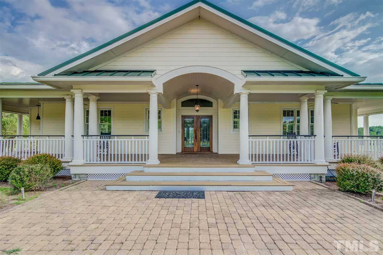 703 Kirk Adams Road Angier, NC 27501 - Photo 6 of 25 Large Patio out front in addition to the porch, plenty of entertaining space!