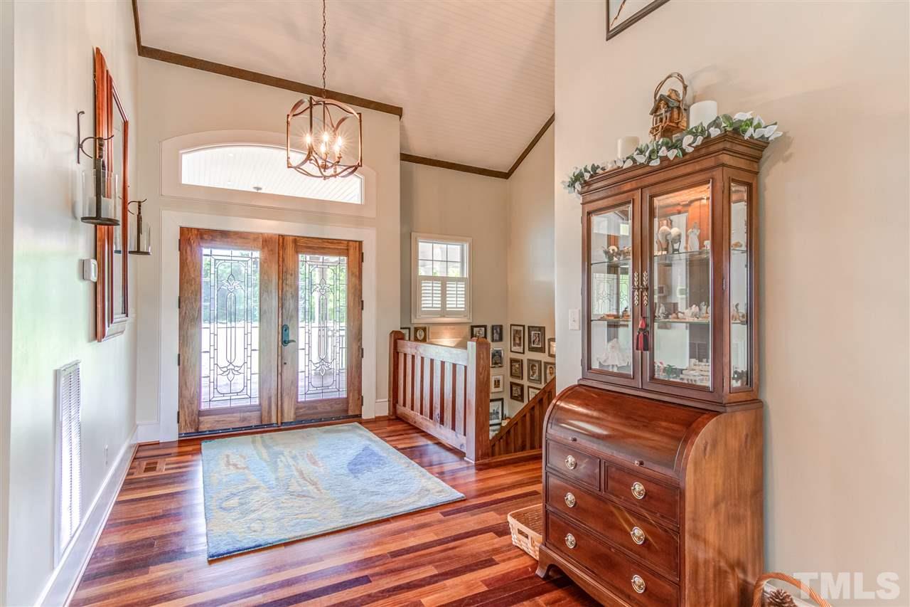 703 Kirk Adams Road Angier, NC 27501 - Photo 8 of 25 Gorgeous (and durable!) Brazilian Cumaru Teak Floors throughout this home.