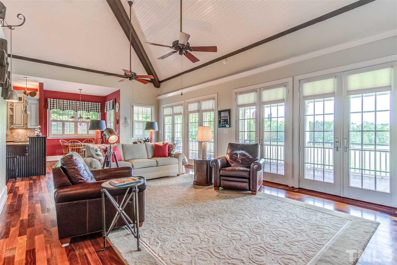 703 Kirk Adams Road Angier, NC 27501 - Photo 9 of 25 High Ceilings and an entire wall of French Doors in this spacious Family Room on the Main Floor.
