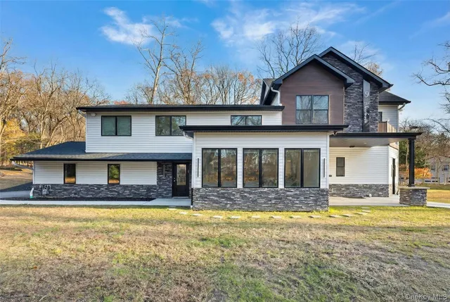 a view of a house with a swimming pool