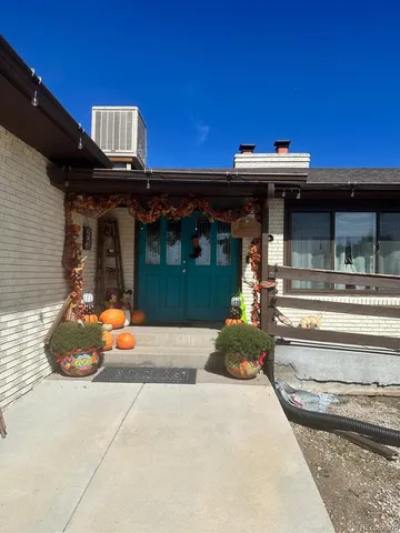a front view of a house with patio