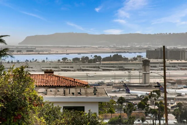 a view of a city with a lake