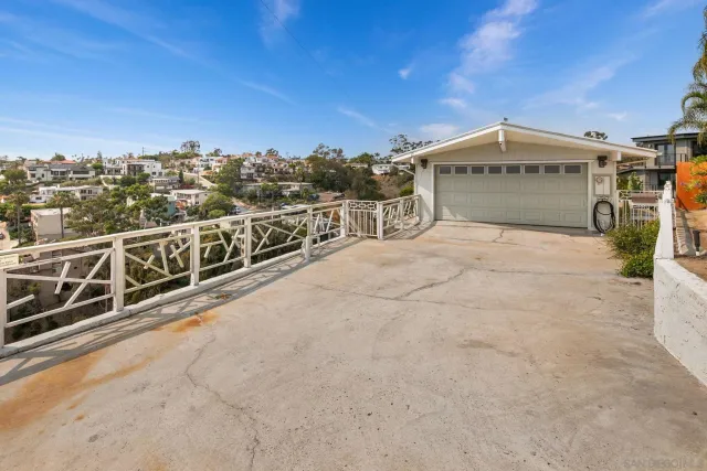 a view of a balcony with city view