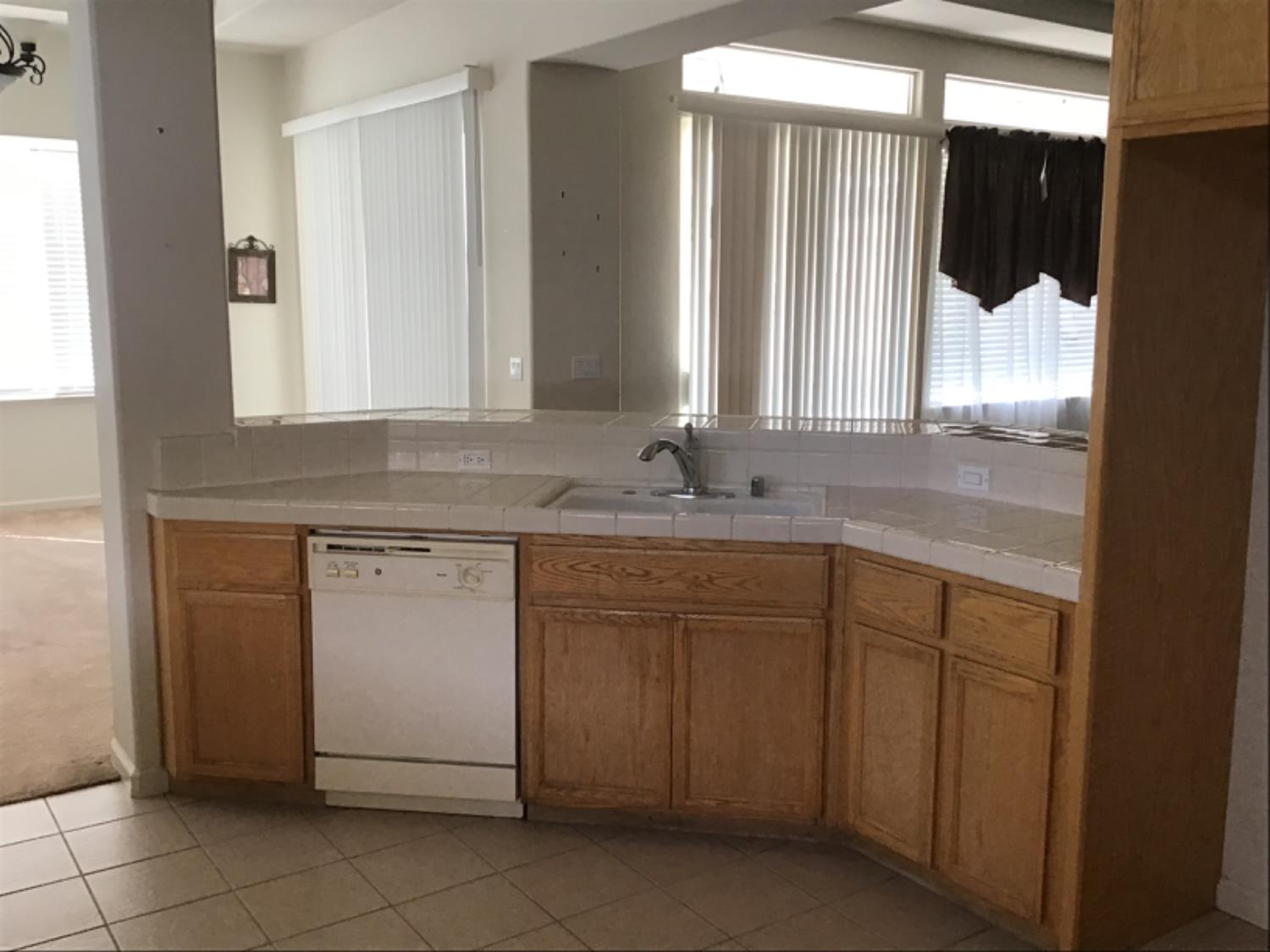 205 Quail Meadow Lane Copperopolis, CA 95228 - Photo 16 of 27 a bathroom with a sink vanity and mirror