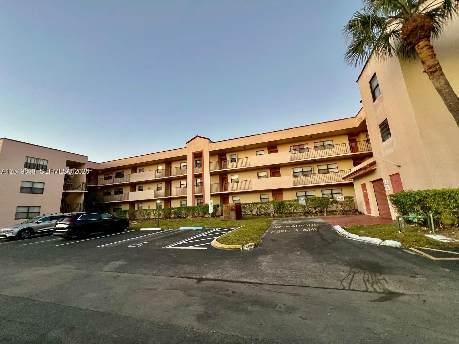 3470 Foxcroft Road, Unit 204 Miramar, FL 33025 - Photo 35 of 40 a front view of a building with street view