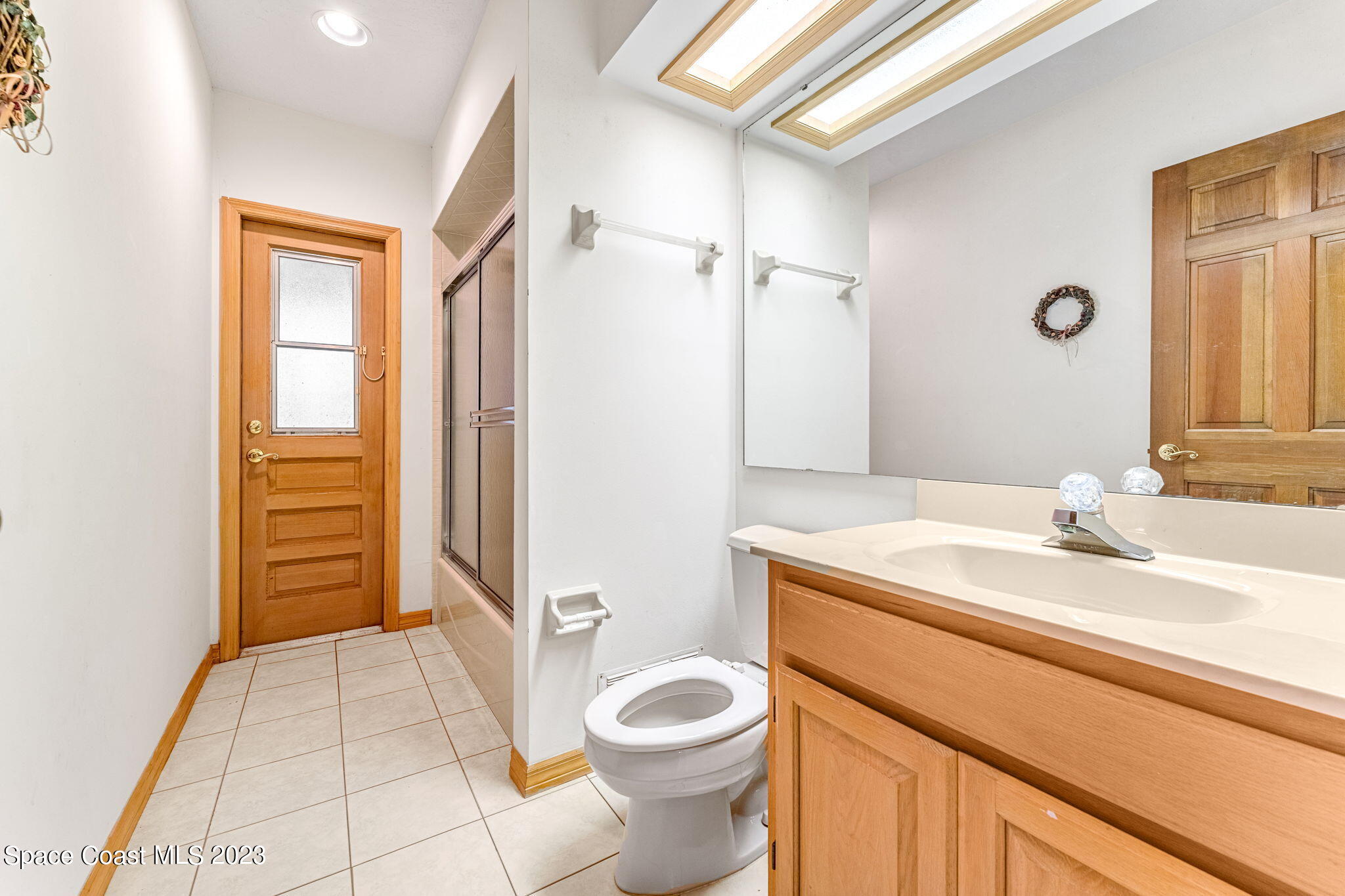 3700 Shady Run Road Melbourne, FL 32934 - Photo 16 of 27 a bathroom with a sink toilet and shower