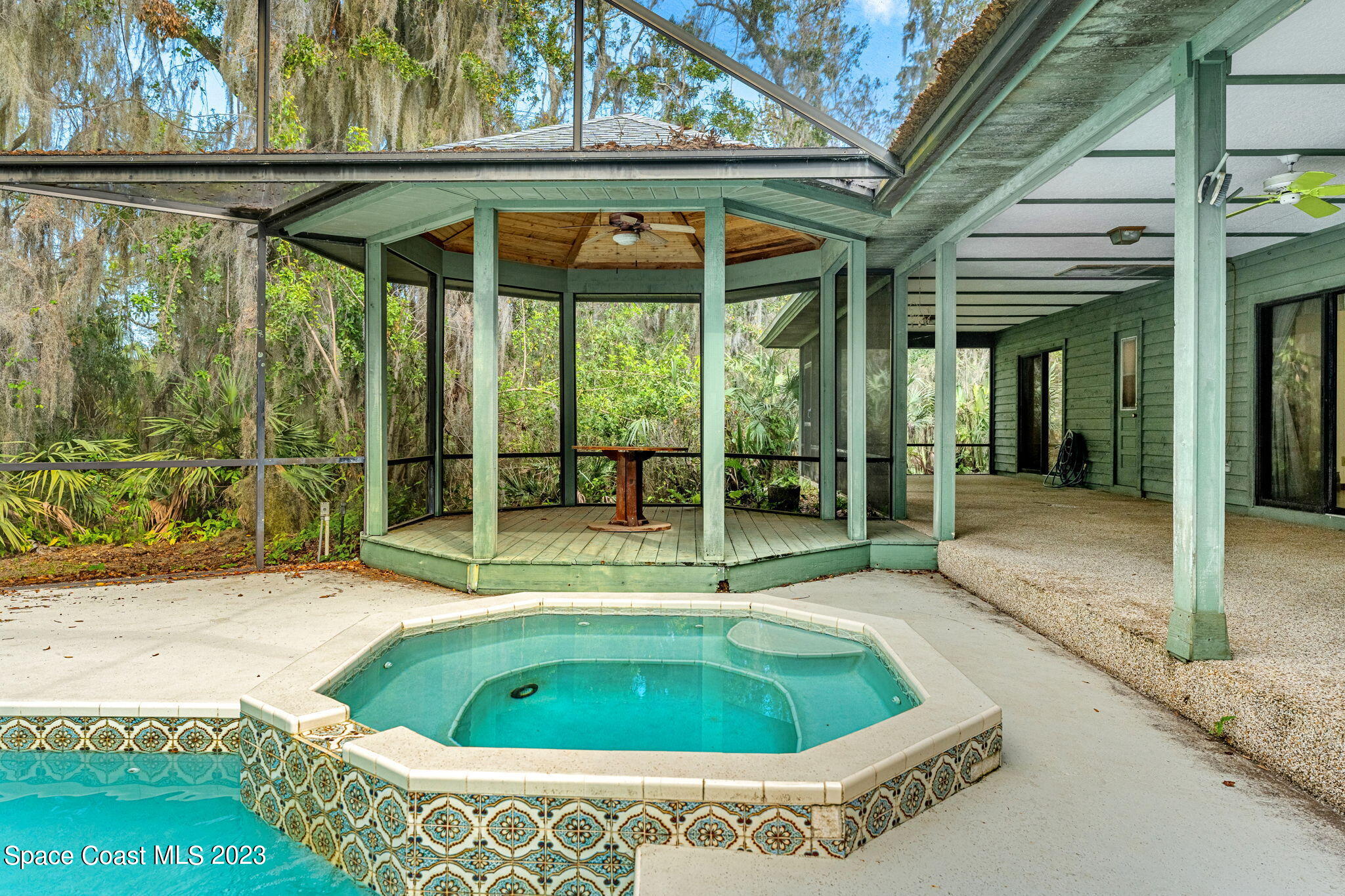 3700 Shady Run Road Melbourne, FL 32934 - Photo 19 of 27 a view of outdoor space swimming pool and furniture