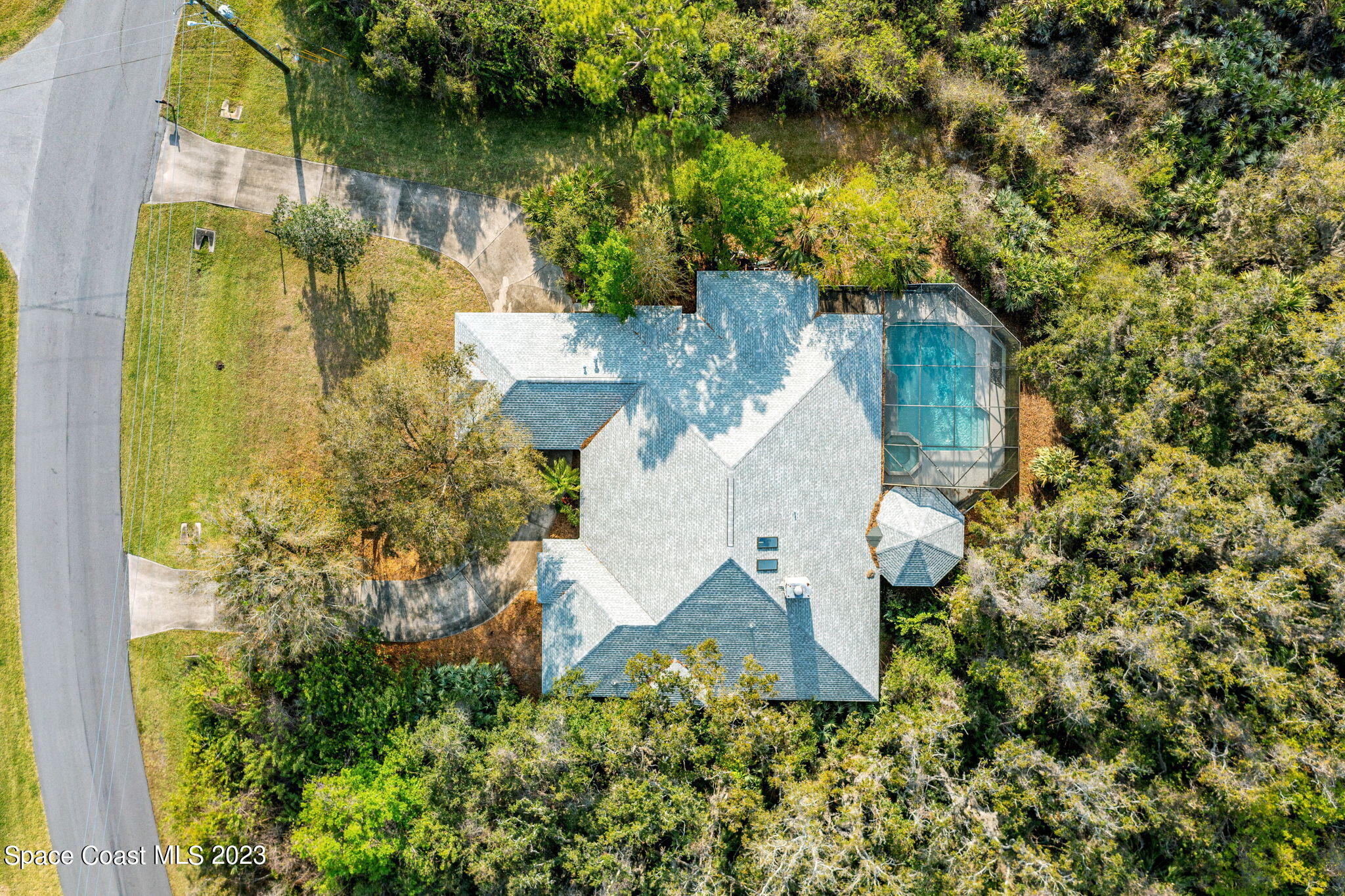 3700 Shady Run Road Melbourne, FL 32934 - Photo 24 of 27 an aerial view of residential house with outdoor space and swimming pool