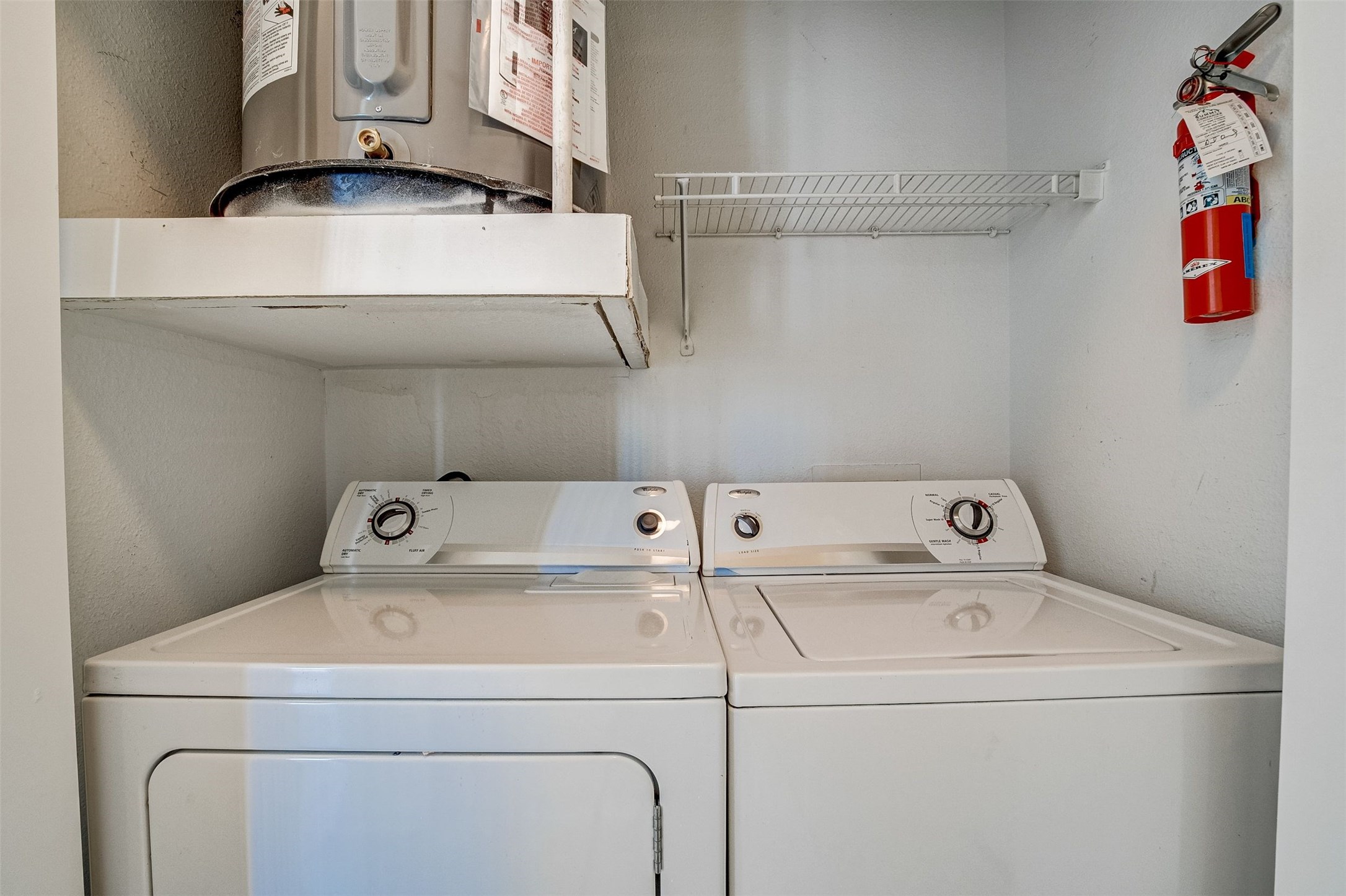 3505 Sage Road, Unit 2403 Houston, TX 77056 - Photo 18 of 26 a utility room with dryer and washer