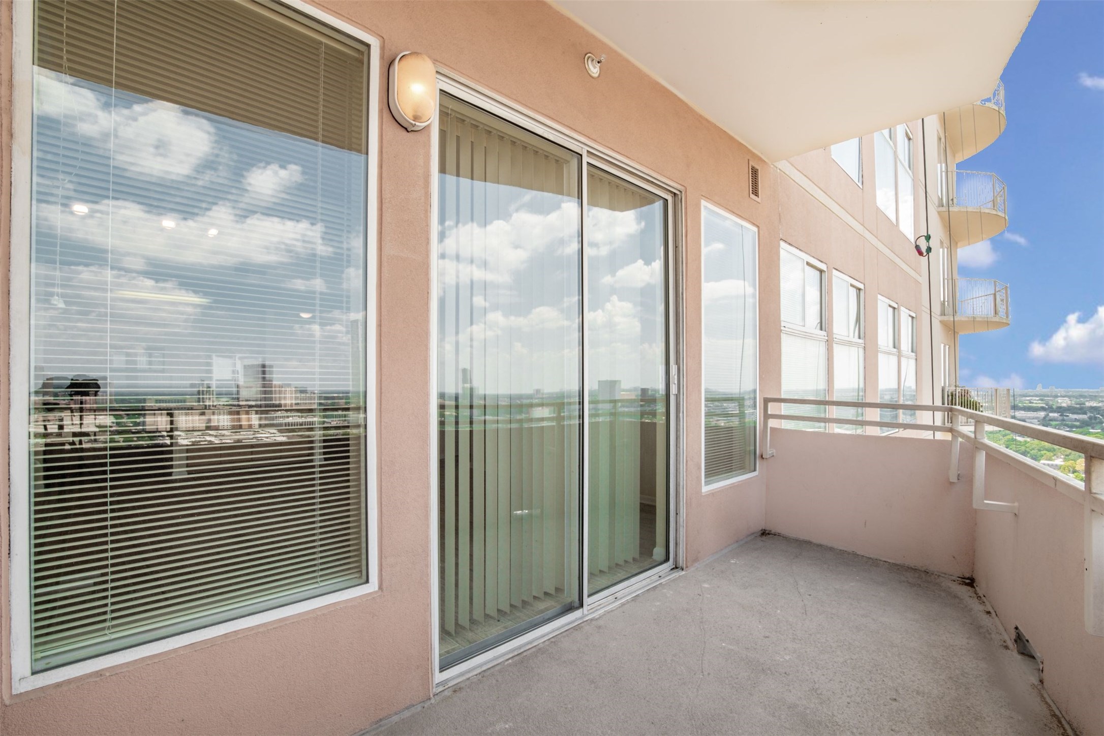 3505 Sage Road, Unit 2403 Houston, TX 77056 - Photo 25 of 26 a view of a city from a balcony