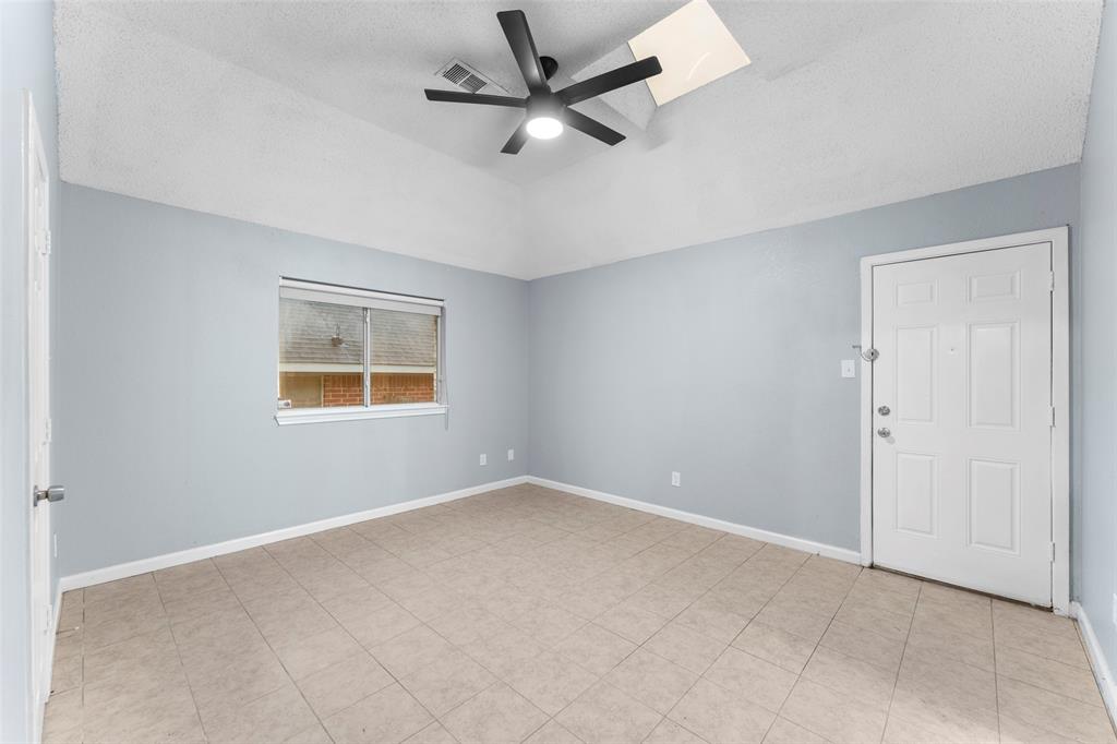 1042 Kim Lane Mesquite, TX 75149 - Photo 7 of 16 a view of an empty room with a window