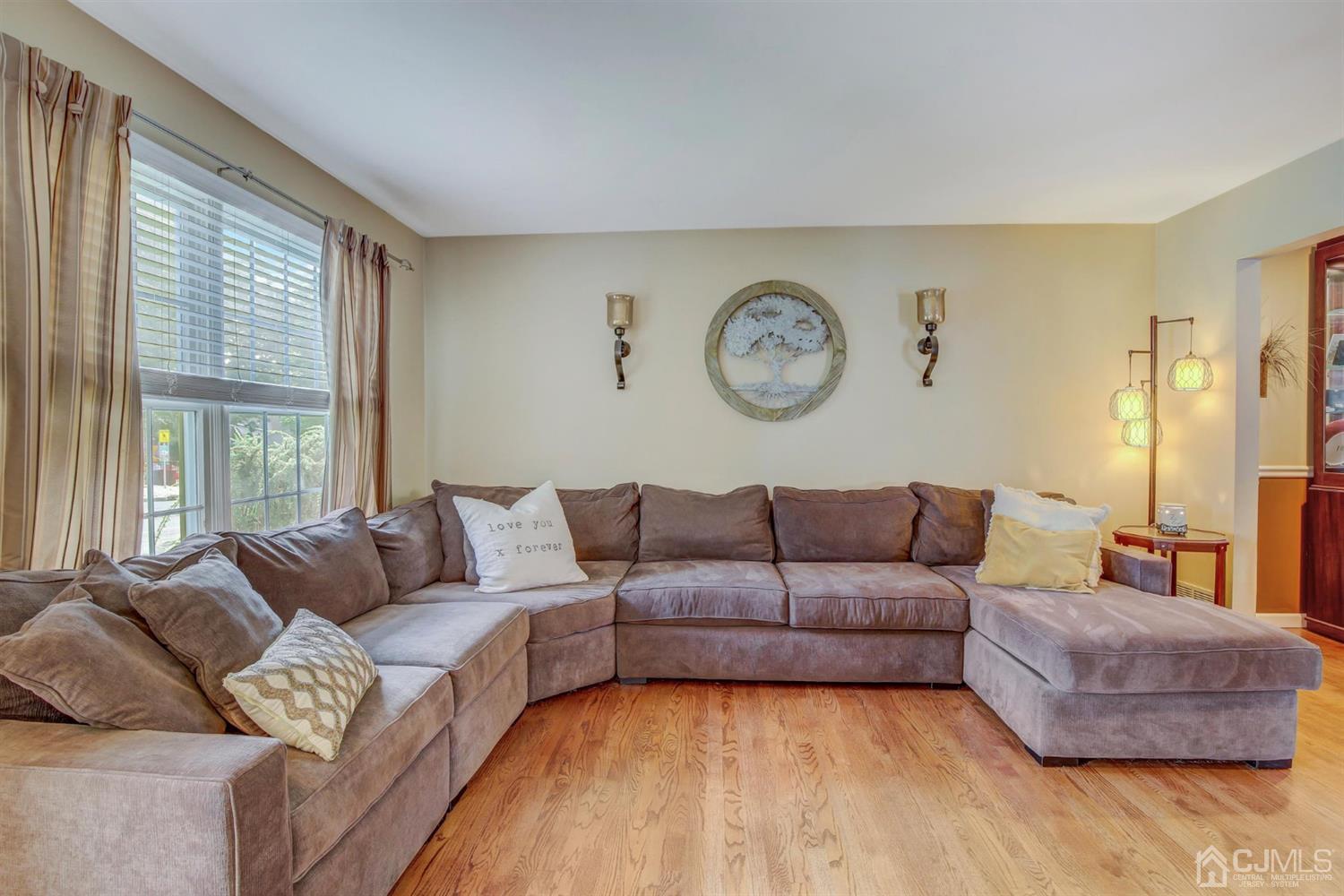 7 Park Place Helmetta, NJ 08828 - Photo 3 of 33 a living room with furniture and a large window