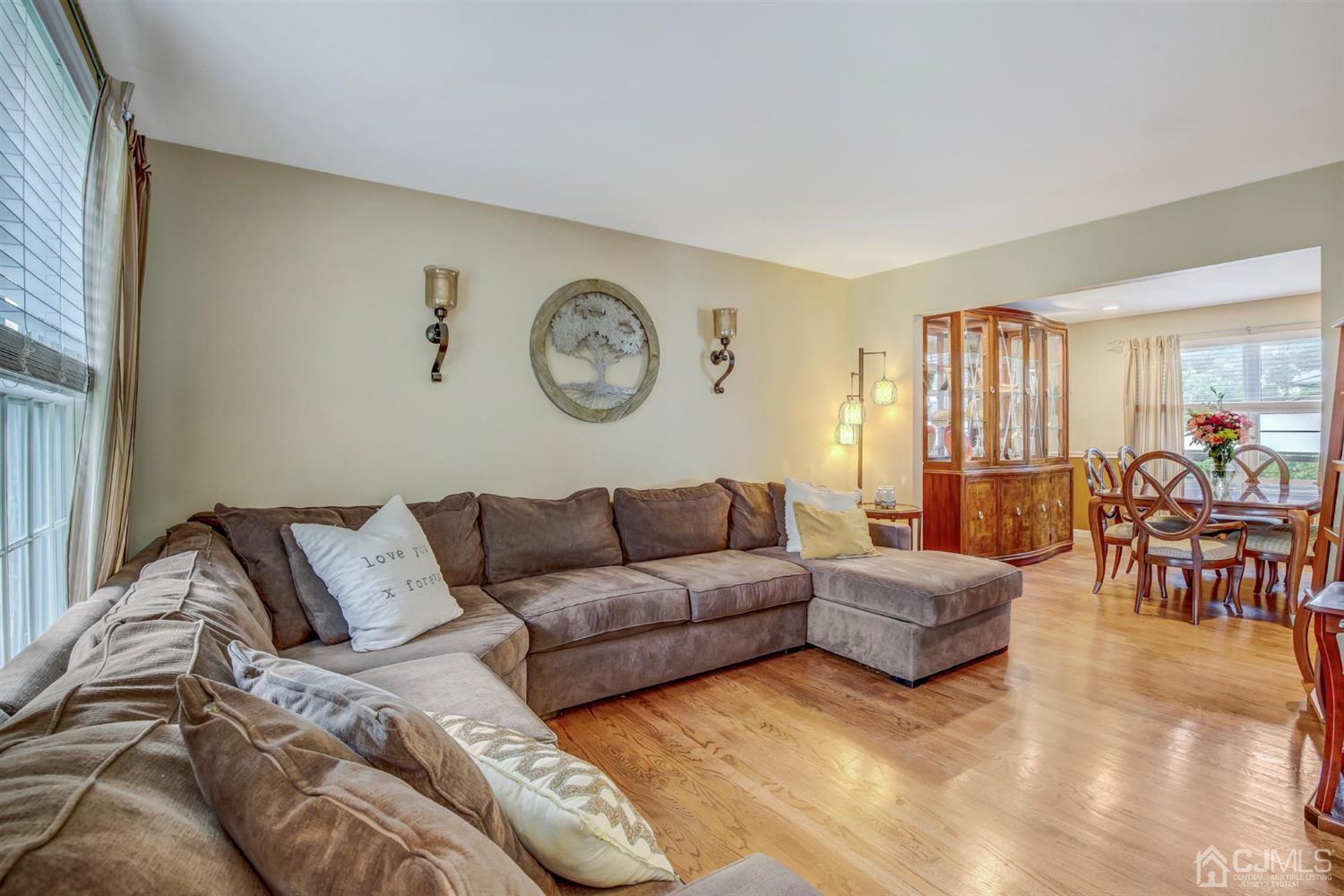 7 Park Place Helmetta, NJ 08828 - Photo 4 of 33 a living room with furniture and a large window