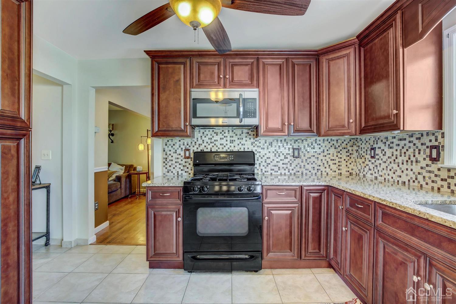 7 Park Place Helmetta, NJ 08828 - Photo 9 of 33 a kitchen with a stove and a sink
