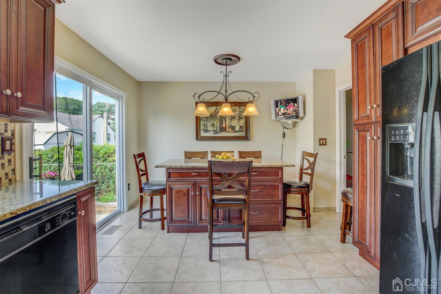 7 Park Place Helmetta, NJ 08828 - Photo 10 of 33 a view of a dining room with furniture window and outside view