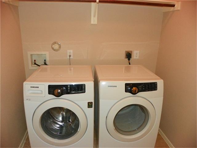 2926 Meadowglen Crest Houston, TX 77082 - Photo 21 of 22 Washed & Dryer are included and Utility Room is conveniently located upstairs