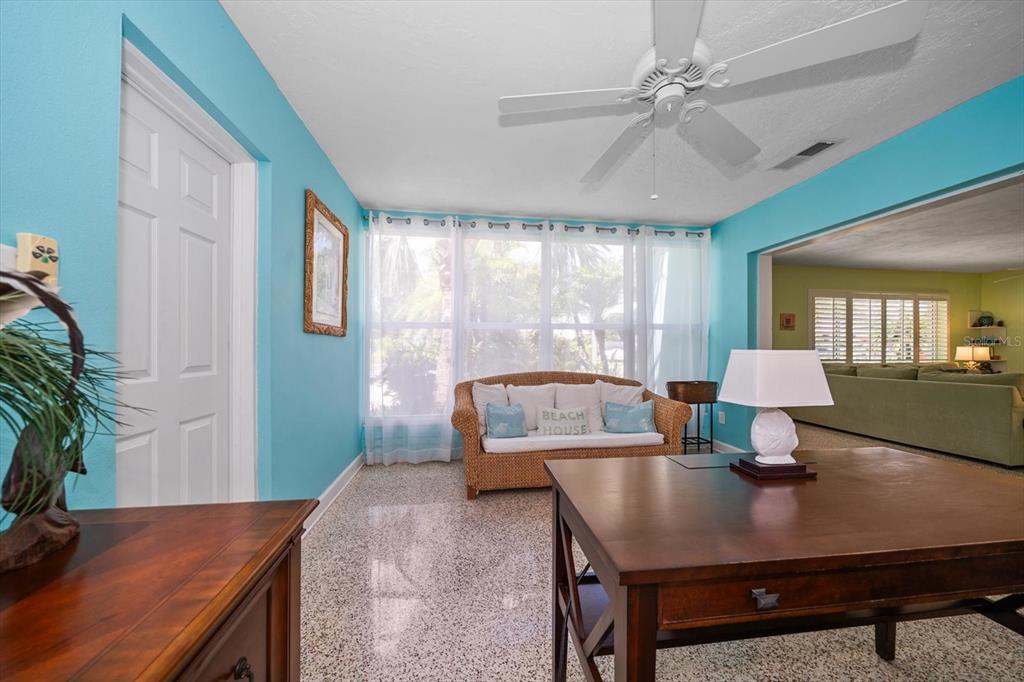 301 Cevera Road Dunedin, FL 34698 - Photo 13 of 33 a living room with furniture and a table