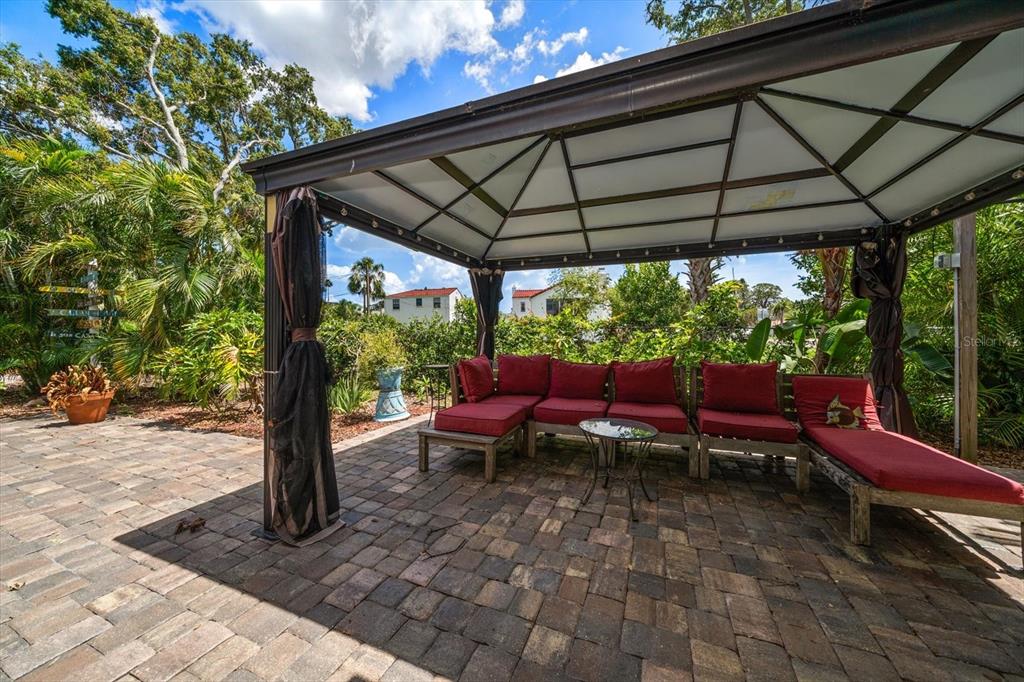 301 Cevera Road Dunedin, FL 34698 - Photo 30 of 33 a view of a chairs and table in the patio