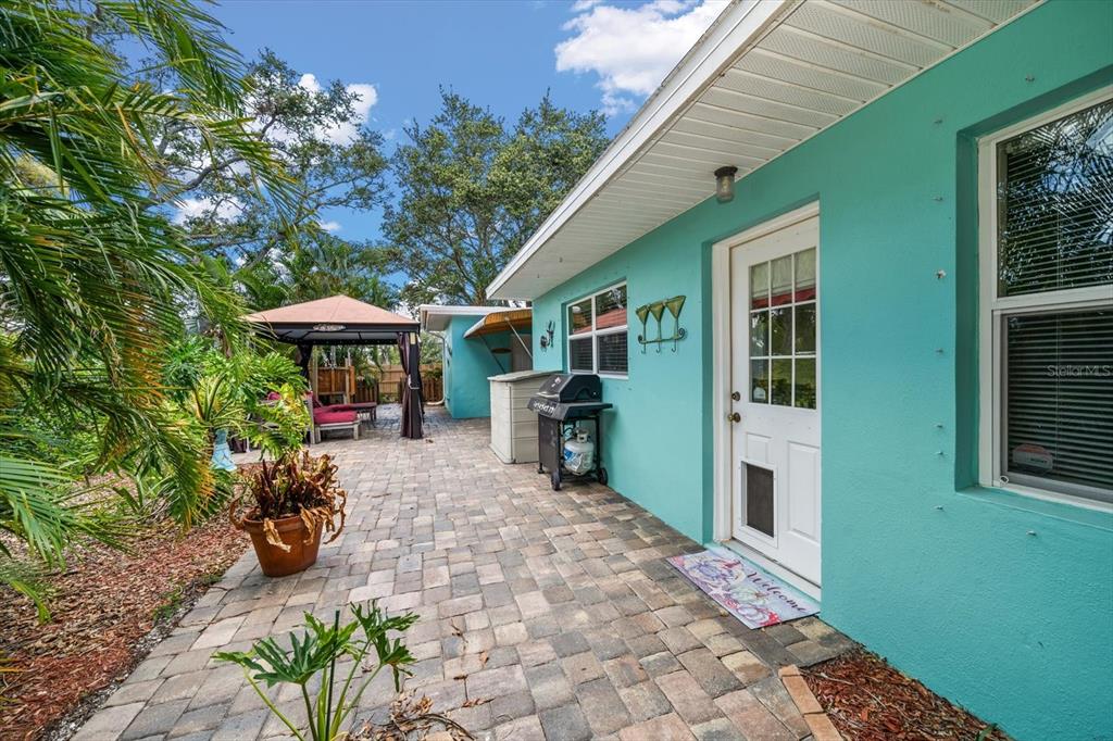 301 Cevera Road Dunedin, FL 34698 - Photo 33 of 33 a front view of a house with garden