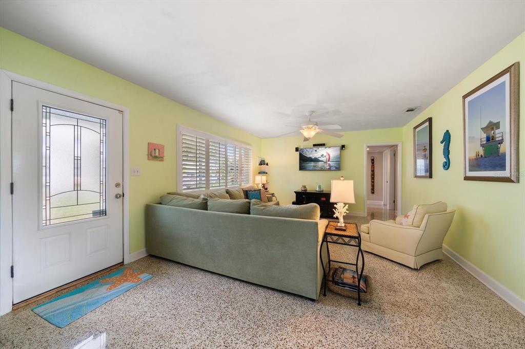 301 Cevera Road Dunedin, FL 34698 - Photo 5 of 33 a living room with furniture and a window