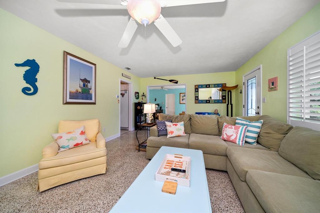 301 Cevera Road Dunedin, FL 34698 - Photo 8 of 33 a living room with furniture and a couch