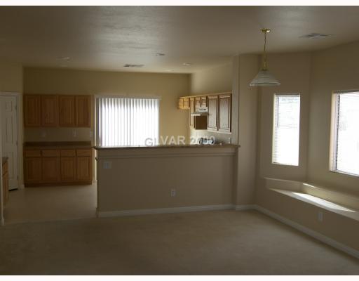 8931 Austin Ridge Avenue Las Vegas, NV 89178 - Photo 5 of 13 Dining Room. DINING ROOM LOOKING IN TO KITCHEN