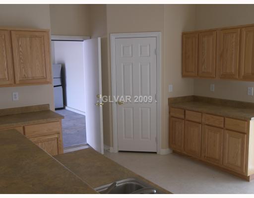 8931 Austin Ridge Avenue Las Vegas, NV 89178 - Photo 7 of 13 Kitchen. KITCHEN WITH WALK IN PANTRY