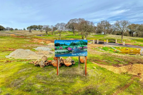 a view of an outdoor space pool patio and outdoor seating