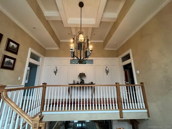 a view of a balcony with wooden floor