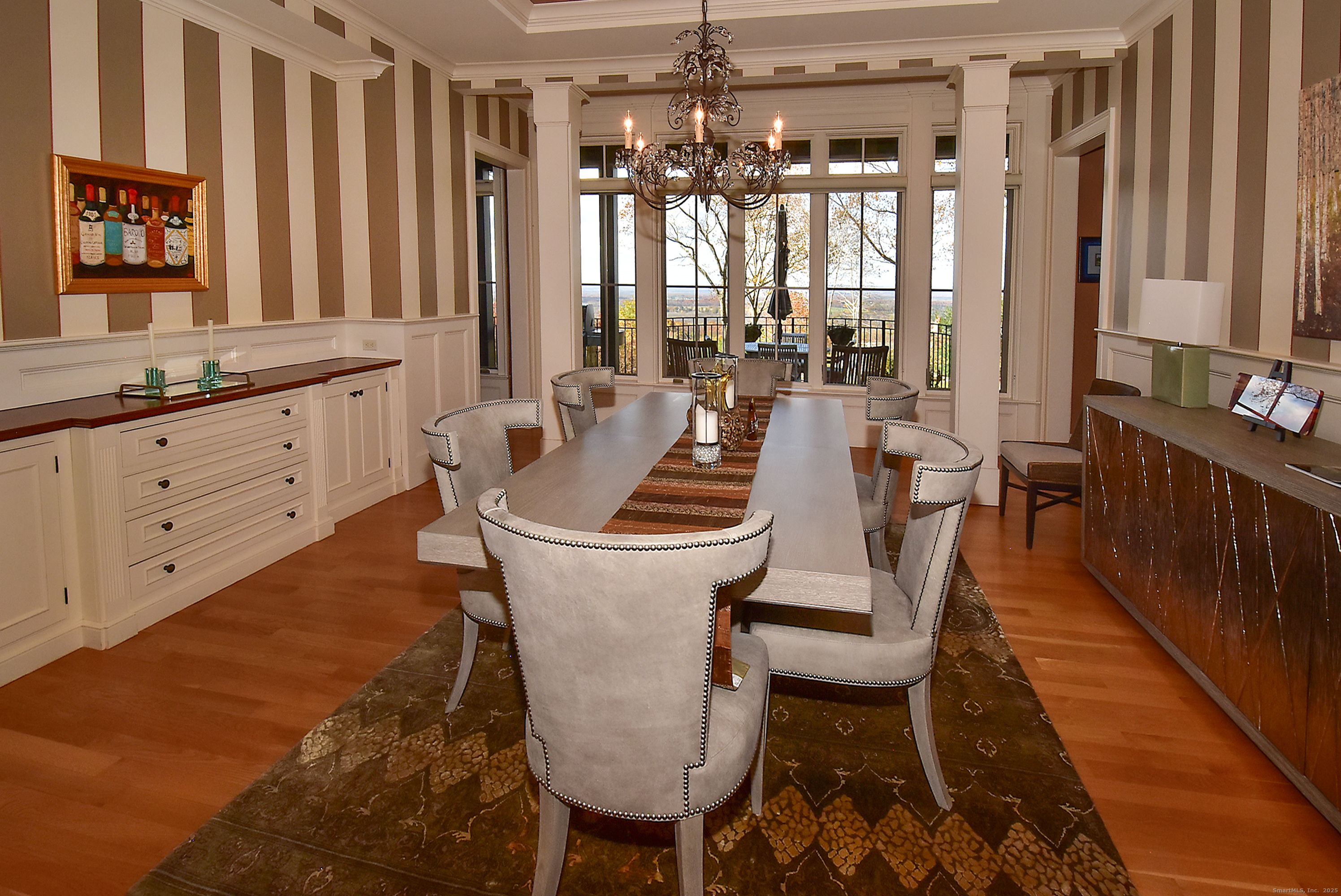 6 Setting Sun Trail Ellington, CT 06029 - Photo 15 of 40 a living room with furniture a window and a chandelier