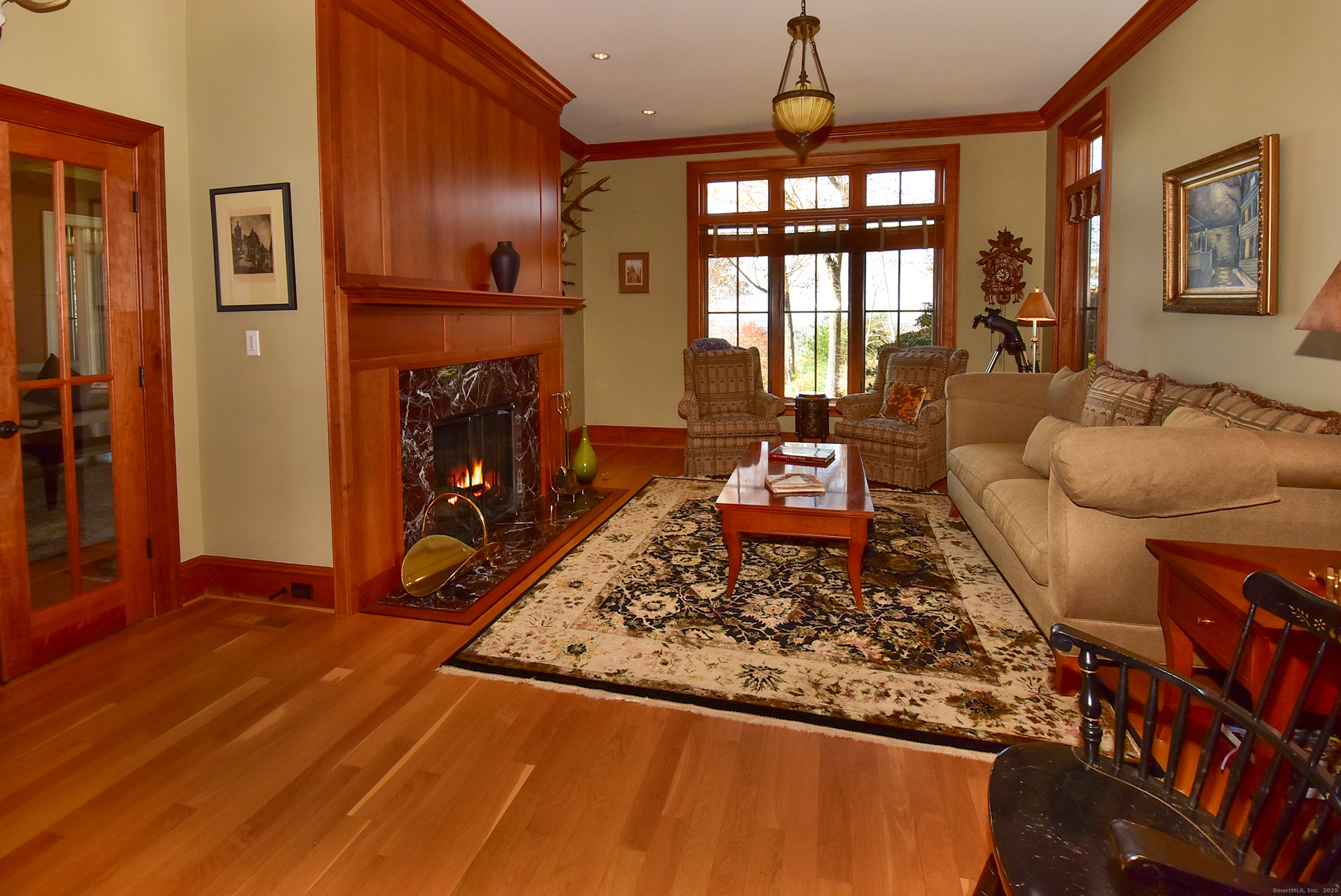 6 Setting Sun Trail Ellington, CT 06029 - Photo 18 of 40 a living room with furniture and a fireplace