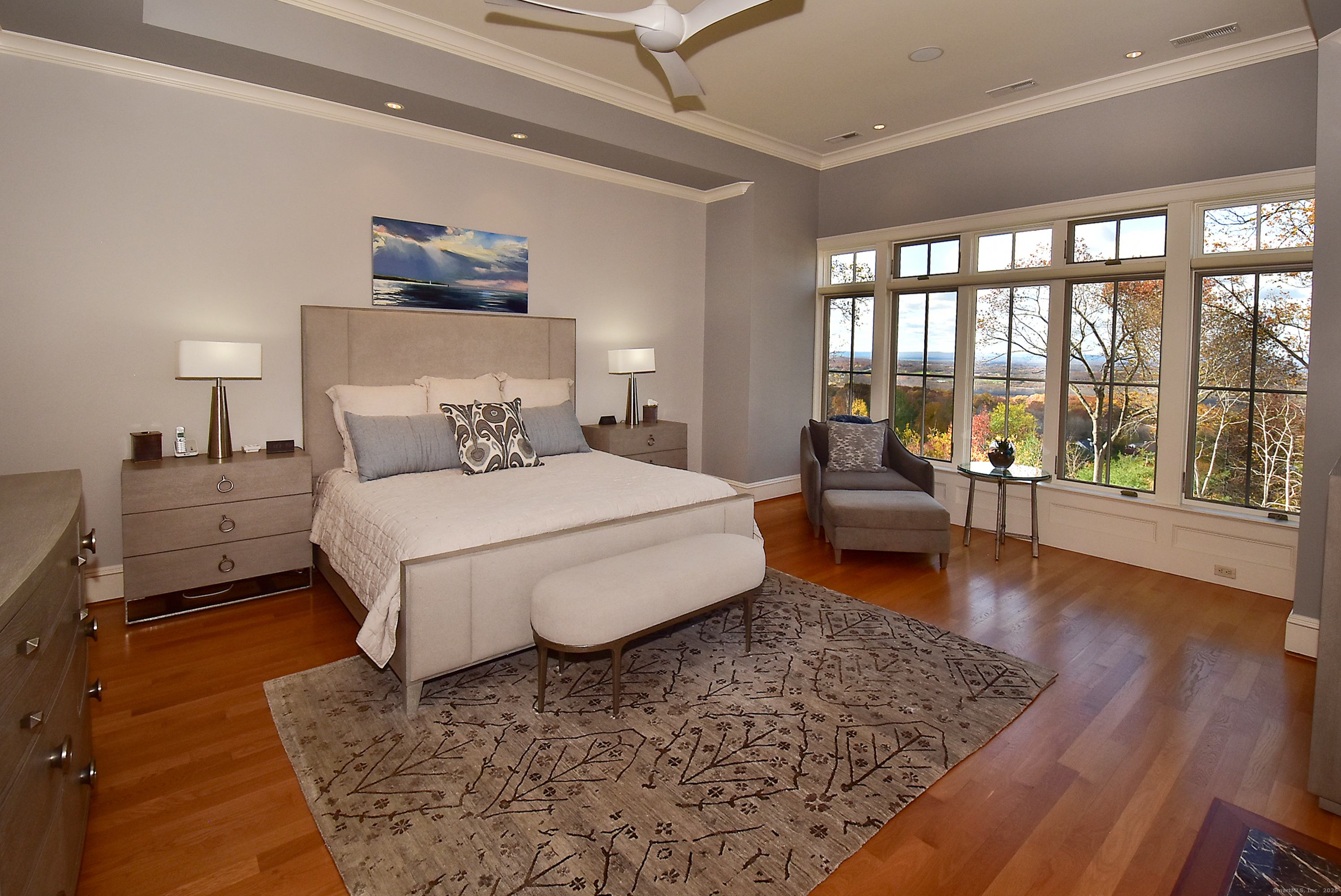 6 Setting Sun Trail Ellington, CT 06029 - Photo 28 of 40 a bedroom with a large bed and a large window with rug