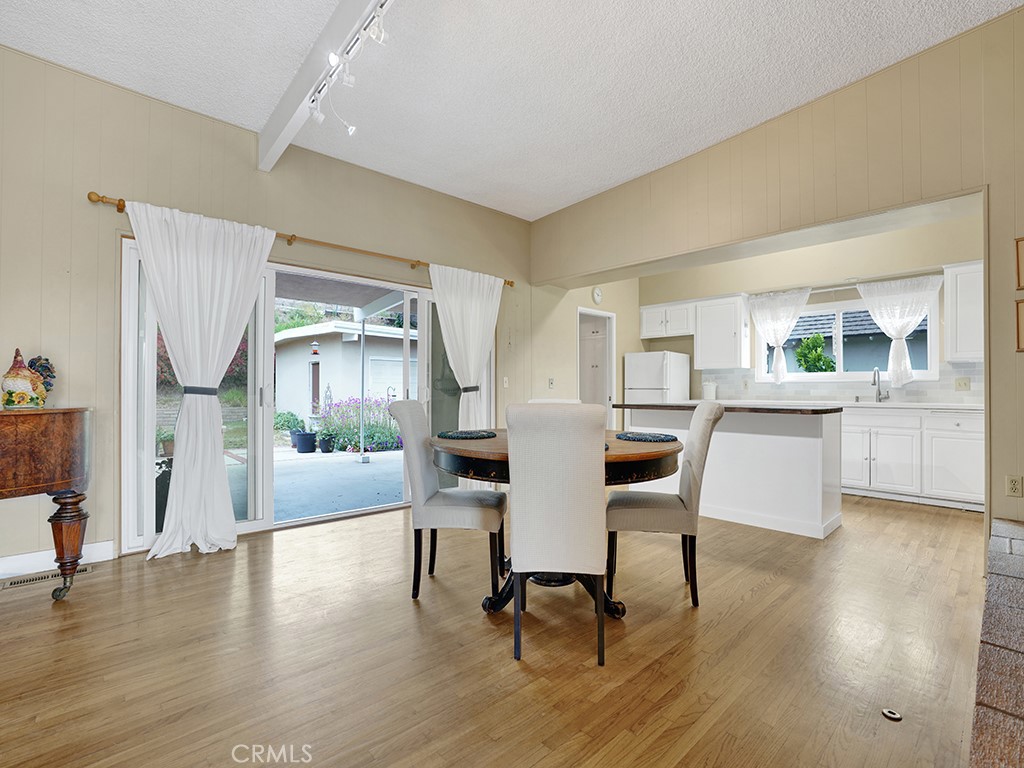 1019 Dorothy Lane Fullerton, CA 92831 - Photo 14 of 41 a view of a dining room with furniture and wooden floor