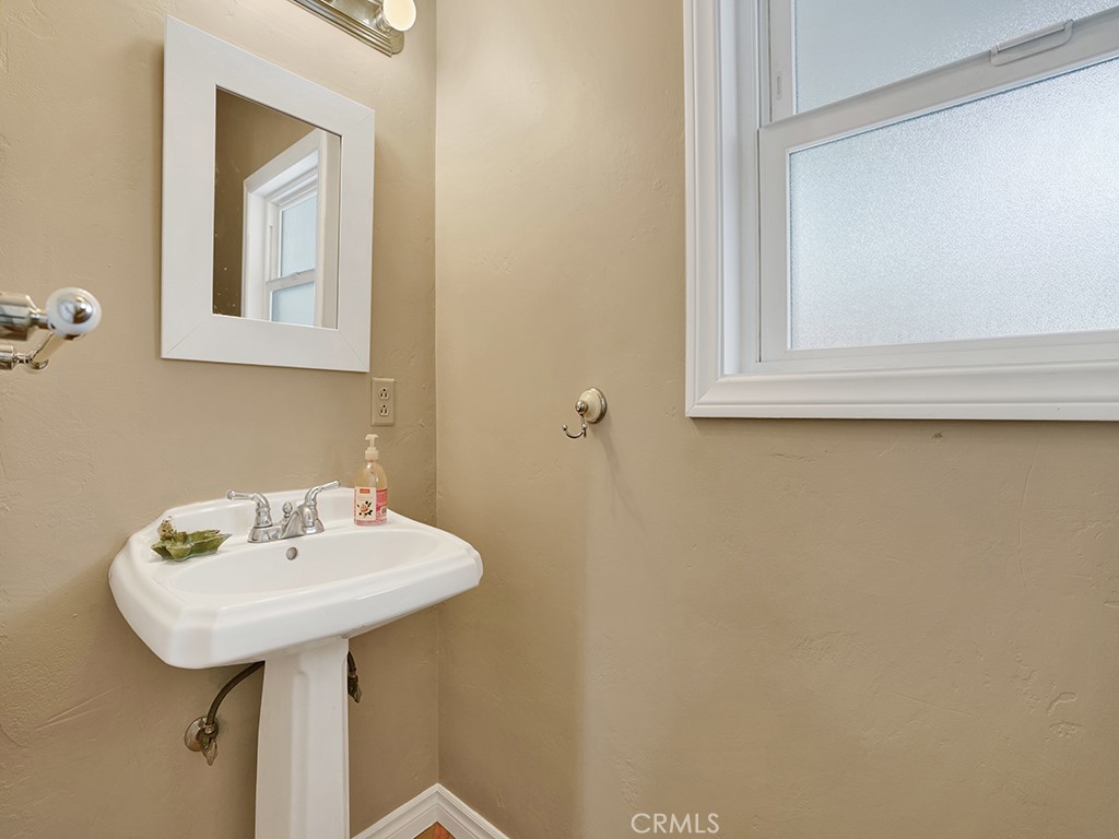 1019 Dorothy Lane Fullerton, CA 92831 - Photo 23 of 41 a bathroom with a sink and a mirror