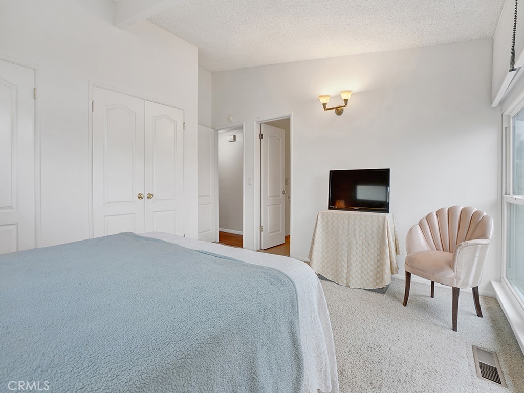 1019 Dorothy Lane Fullerton, CA 92831 - Photo 26 of 41 a bedroom with a bed and chair