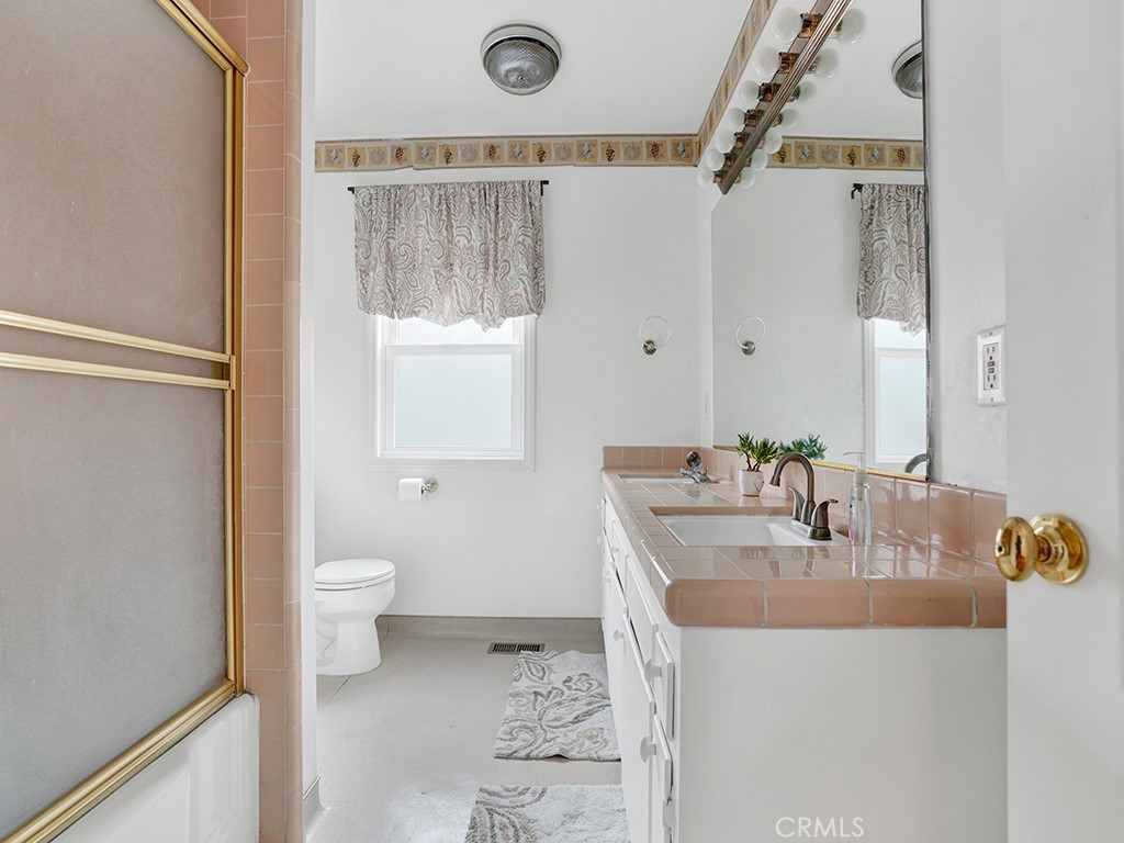 1019 Dorothy Lane Fullerton, CA 92831 - Photo 33 of 41 a bathroom with a sink toilet and shower
