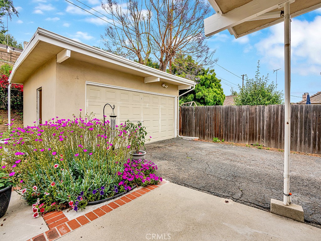 1019 Dorothy Lane Fullerton, CA 92831 - Photo 38 of 41 a flower garden is sitting in front of a house