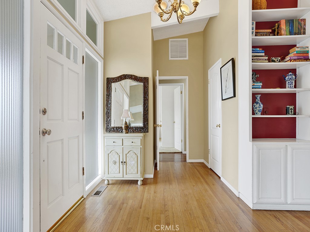 1019 Dorothy Lane Fullerton, CA 92831 - Photo 7 of 41 a view of a hallway with wooden floor and windows