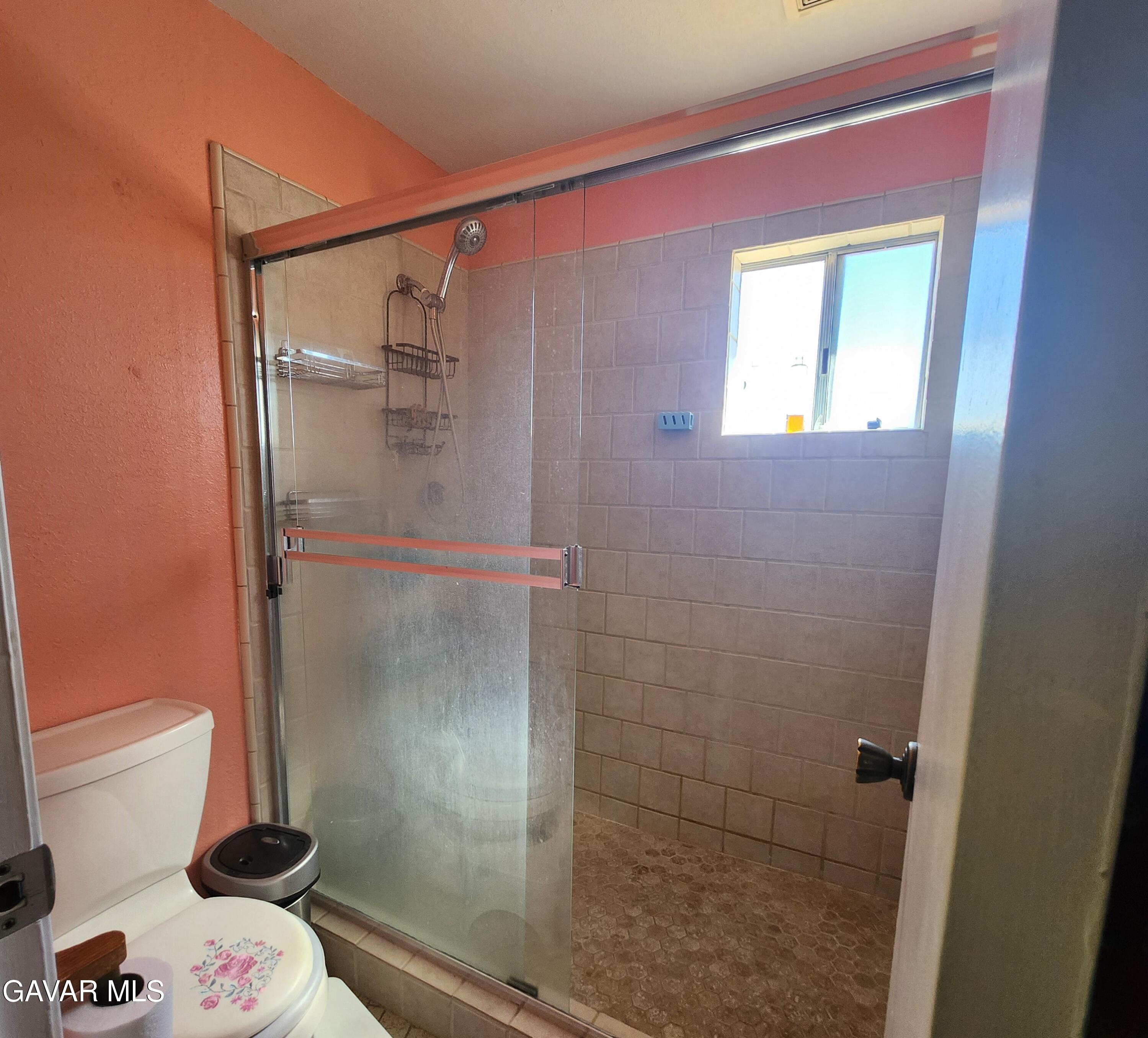 1407 West Burns Avenue Ridgecrest, CA 93555 - Photo 23 of 25 a bathroom with a shower and a toilet