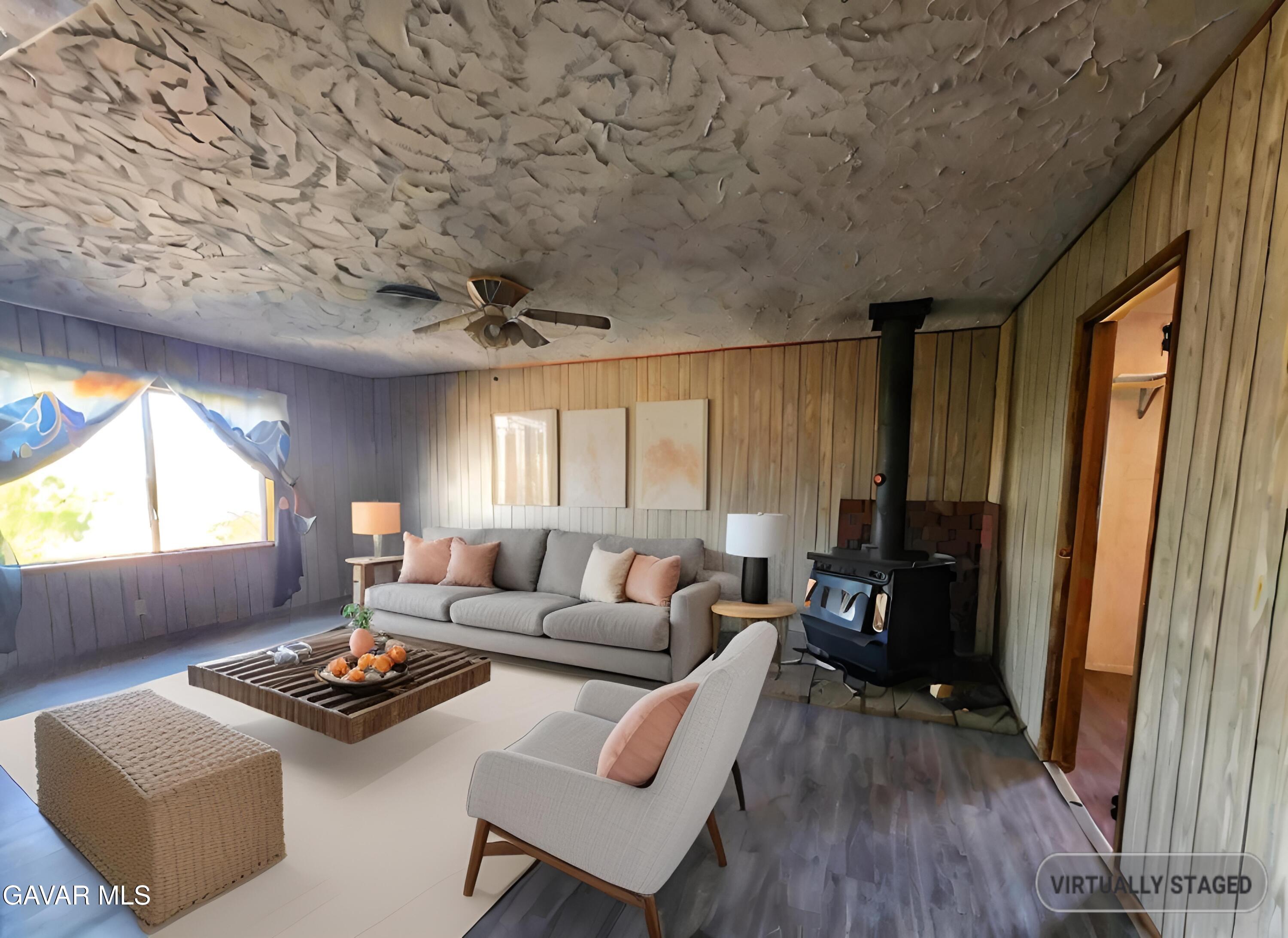 1407 West Burns Avenue Ridgecrest, CA 93555 - Photo 9 of 25 a living room with furniture and a window