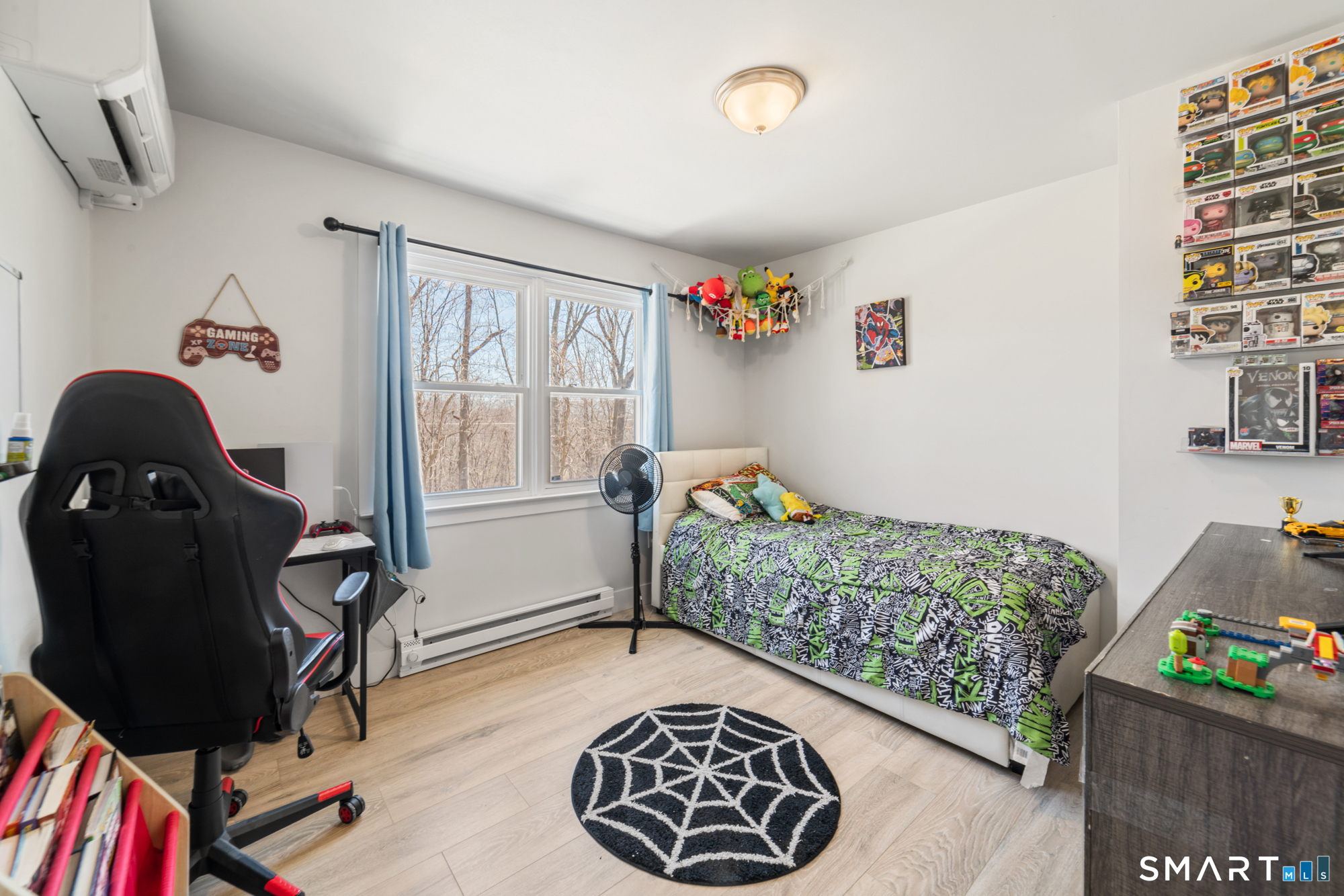 327 Lakeside Boulevard West Waterbury, CT 06708 - Photo 15 of 29 a bedroom with a bed and a window