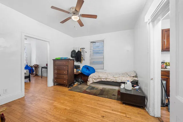 a bedroom with furniture and a bed