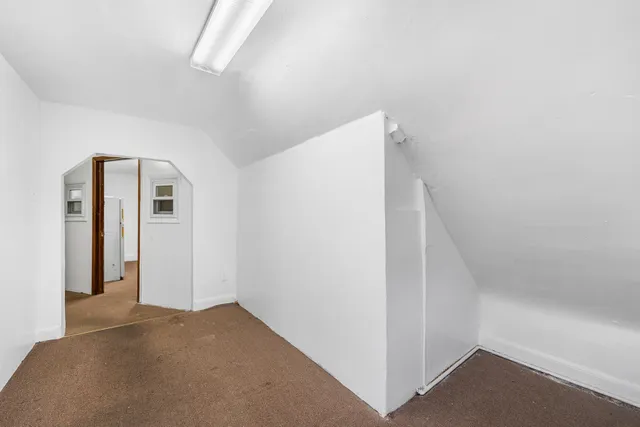 a view of a hallway with closet