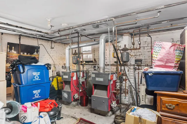 a utility room with lot of items on the wall