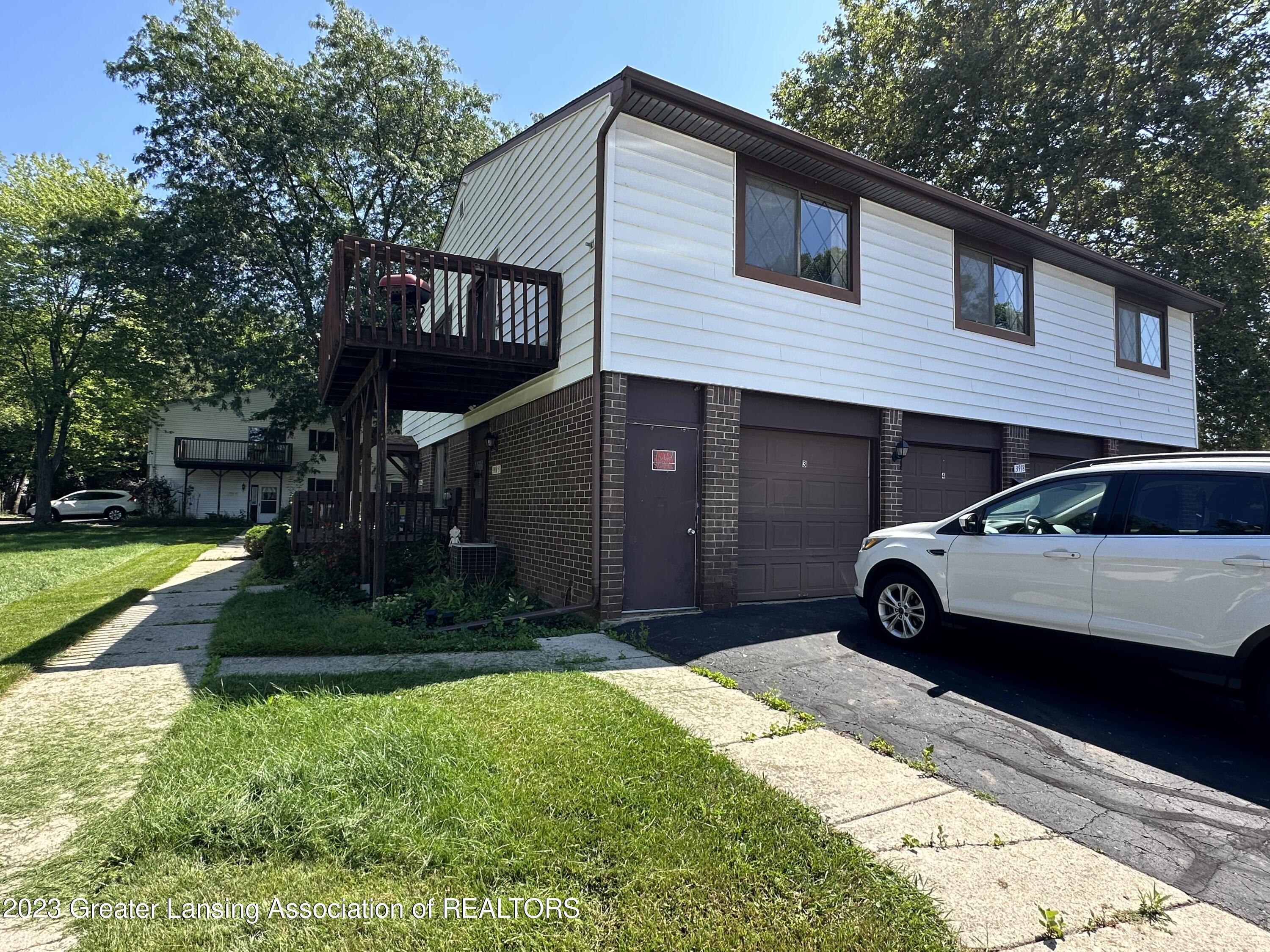 3918 Hunters Ridge Drive, Unit 3 Lansing, MI 48911 - Photo 1 of 21 IMG_5933